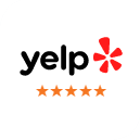Yelp logo with five orange stars rating Prosper Smile Studio dental practice