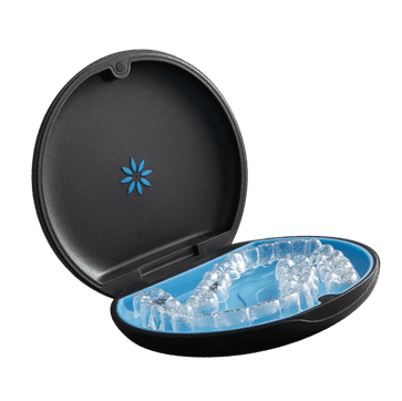 Black portable dental cooler with blue ice pack insert, open lid displaying cooling gel interior.